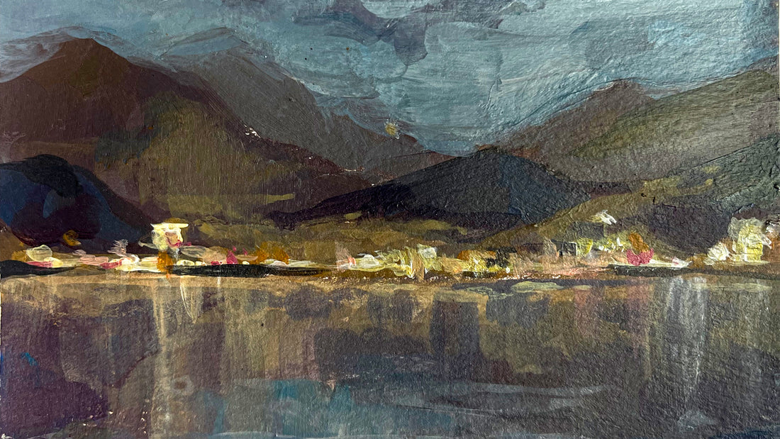 There's an acrylic artwork of beautiful seascape with the water, city lights and mountains in impressionistic style
